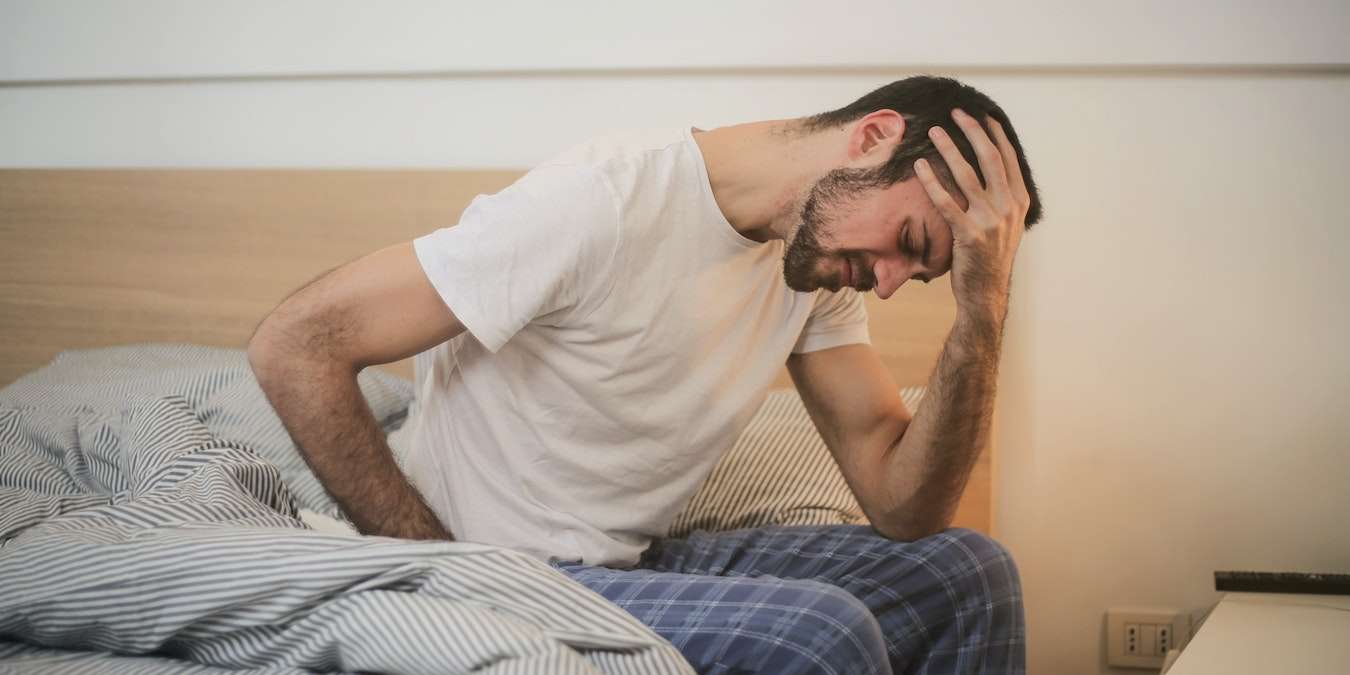 Man Dealing With Burnout Symptoms