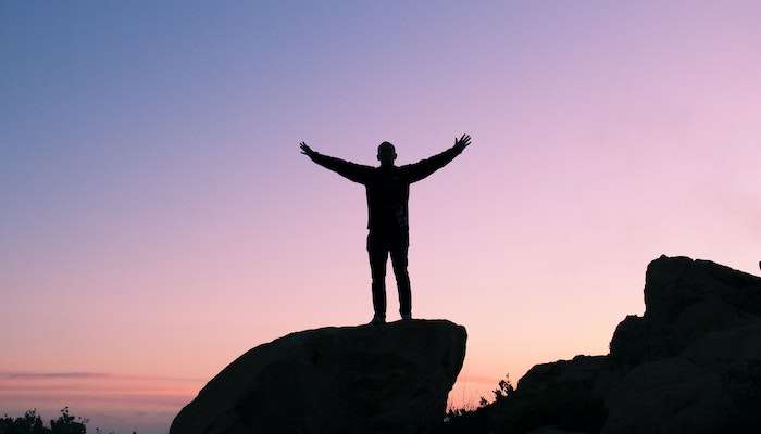 Person At Sunset Celebrating Their Self-Esteem