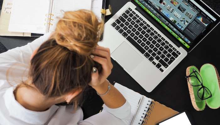 Woman Stressed With No Work Life Balance
