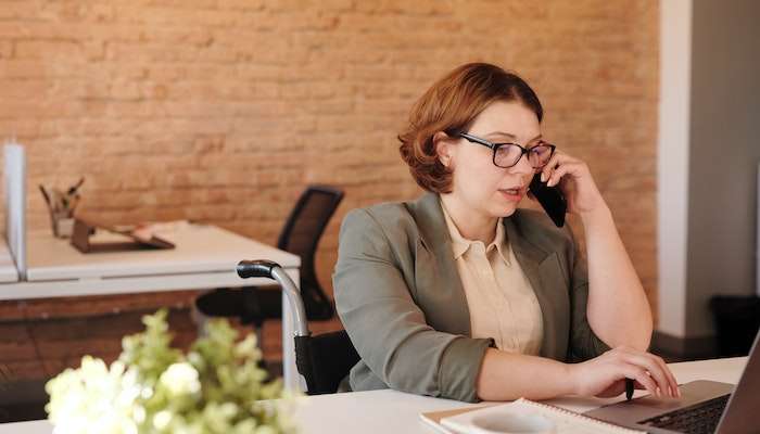 Woman Calling Friend To Cancel