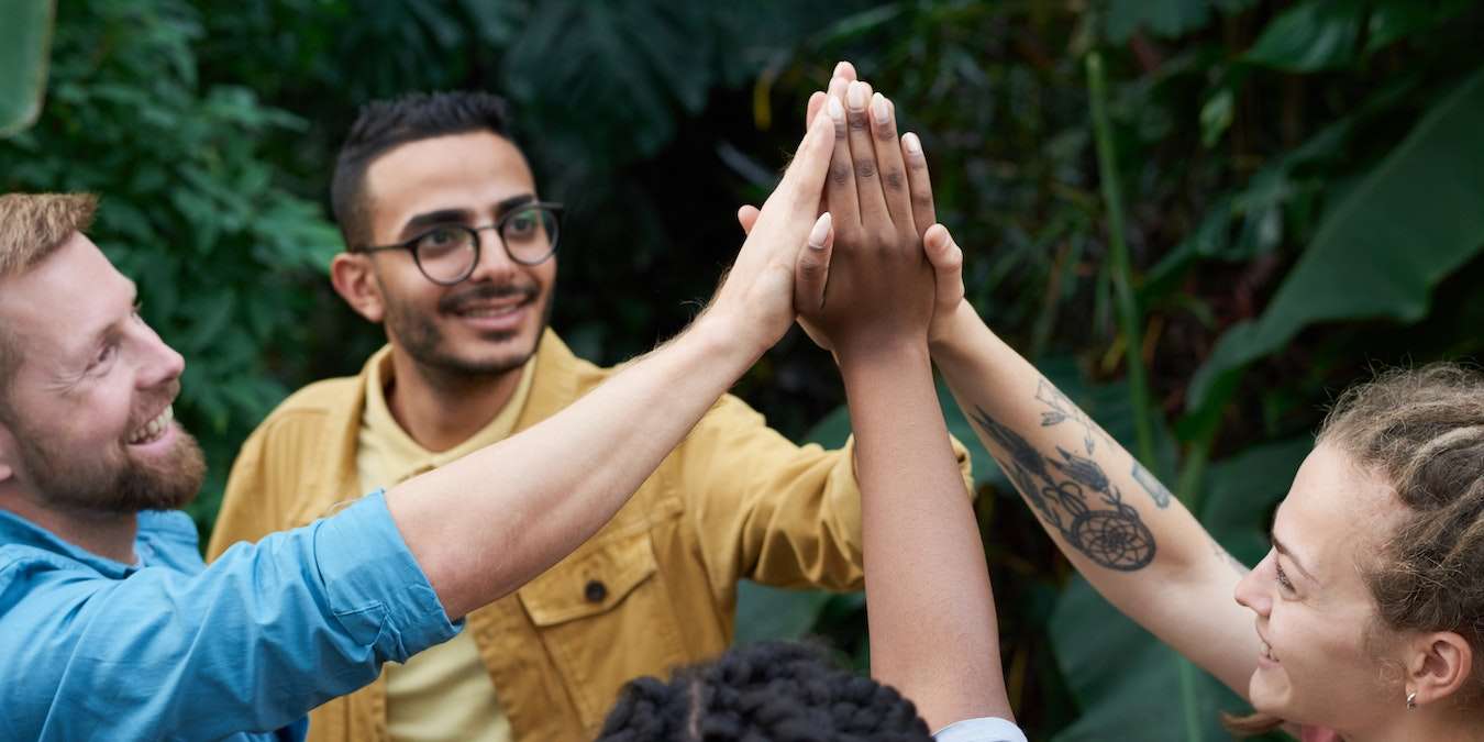 Group of Friends High Five as Social Etiquette