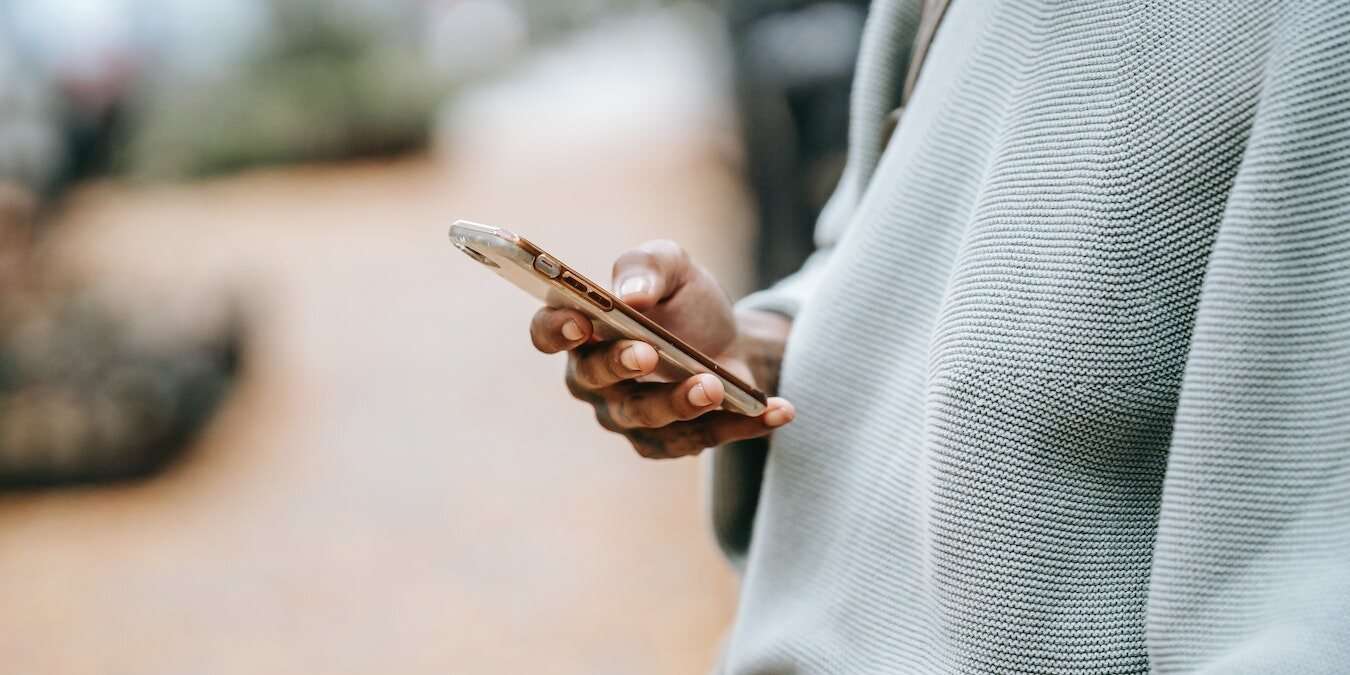 Man Checking Money Management App