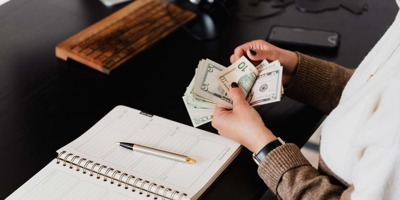 Woman Saving For Emergency Fund