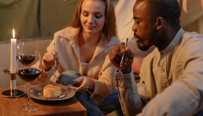 Couple Enjoying Dessert and Wine