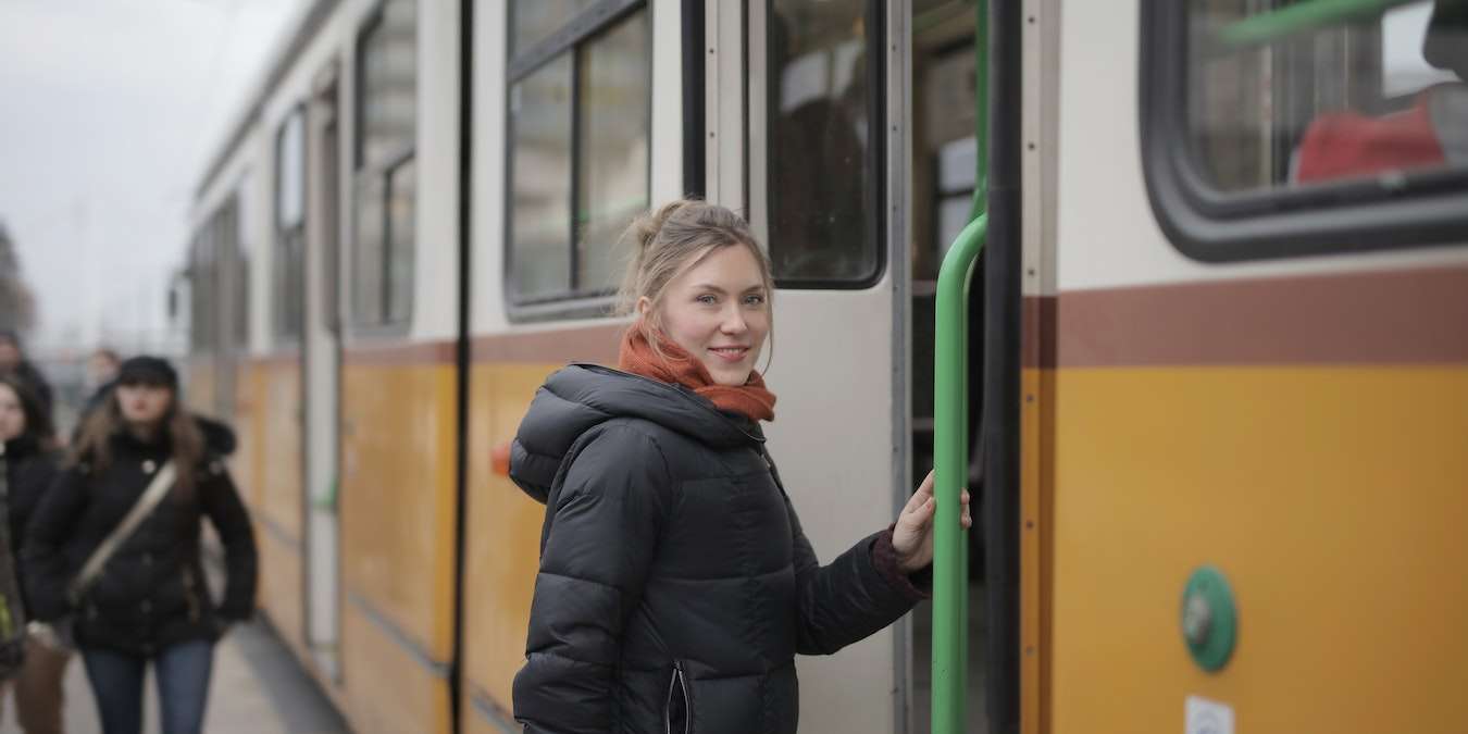 Girl Boarding Train